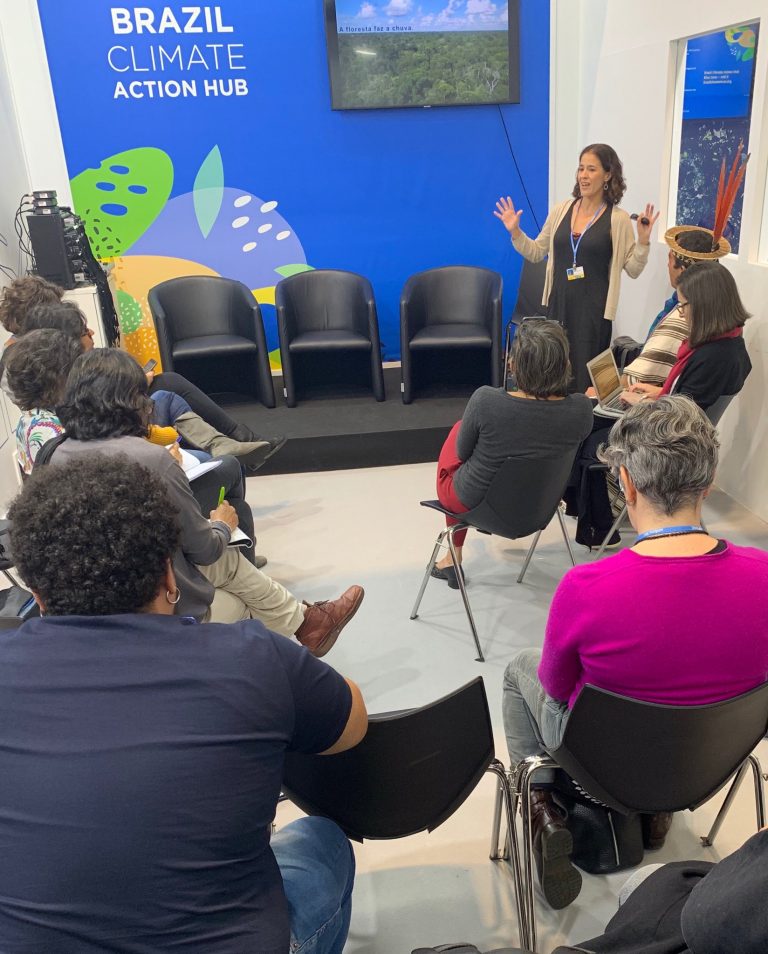 Dr. Marcia Macedo speaks to a group at COP25.