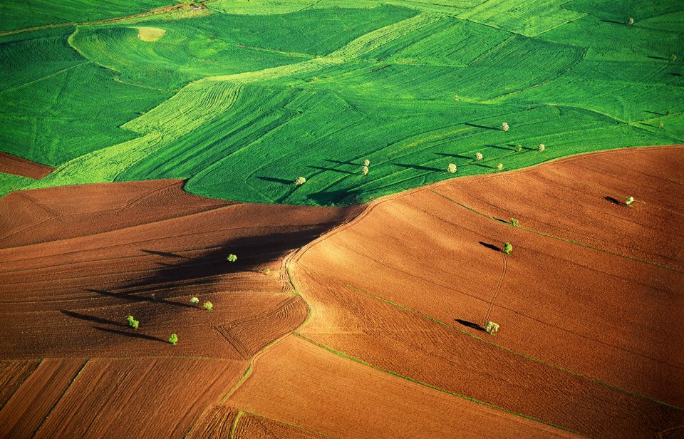 IPCC cover photo image of a large two-tone field.