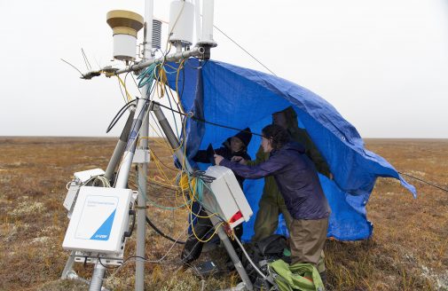 Woodwell scientists installing the flux tower in Alaska.