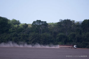 truck on dusty cropfield