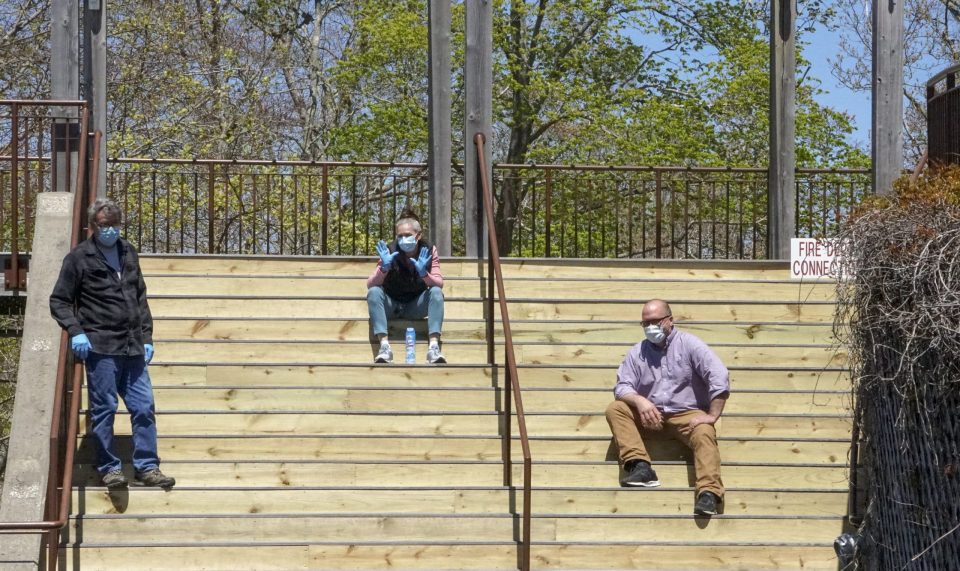 Essential staff on the steps of WHRC.