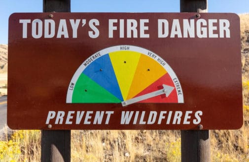 Fire danger level sign pointed to extreme.