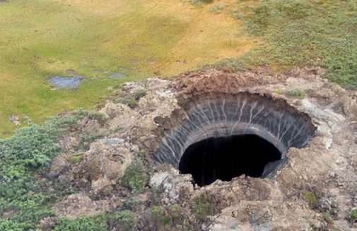 aerial view of a hole created by an explosive release of gas. Photo credit: Marya Zulinova, Press Service of Governor YaNAO