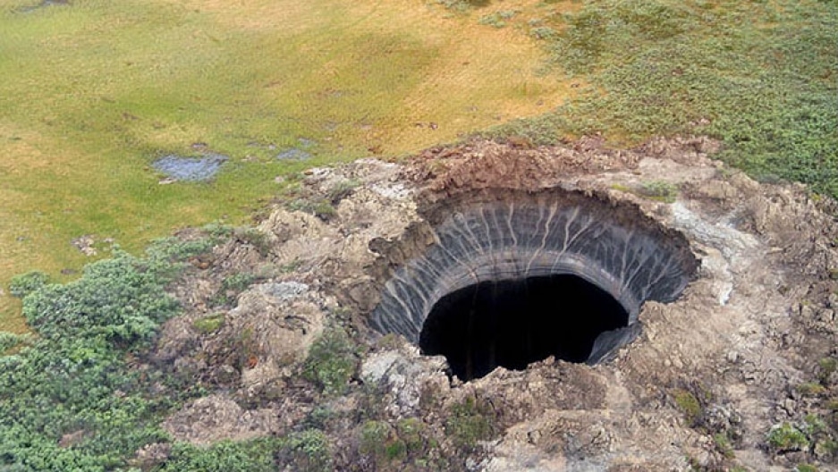 aerial view of a hole created by an explosive release of gas. Photo credit: Marya Zulinova, Press Service of Governor YaNAO