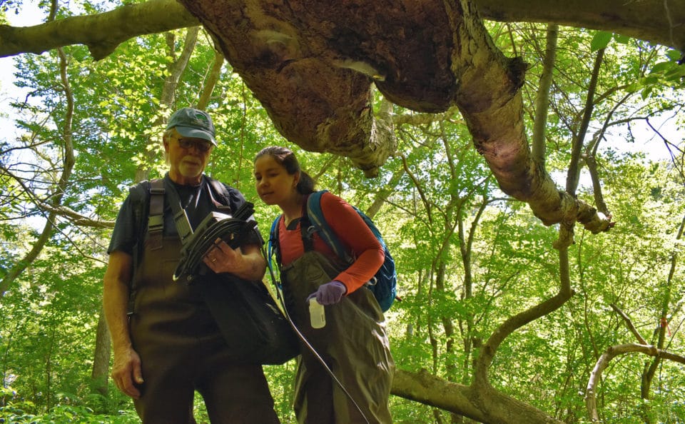 Rob Stenson and Anya Suslova river sampling