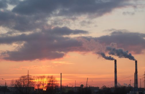 smokestacks at sunset