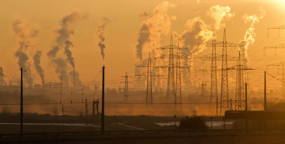 skyline with smokestacks and smog