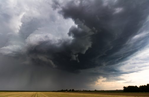 Thunderstorm clouds over cropfield