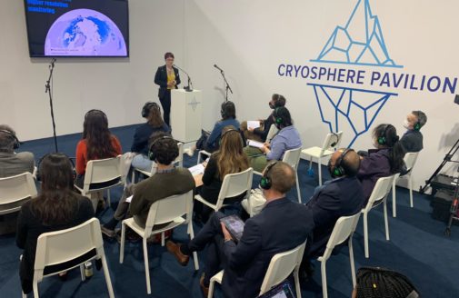 Rachel Treharne speaks in the Cryosphere Pavilion at COP26, photo by Dave McGlinchey