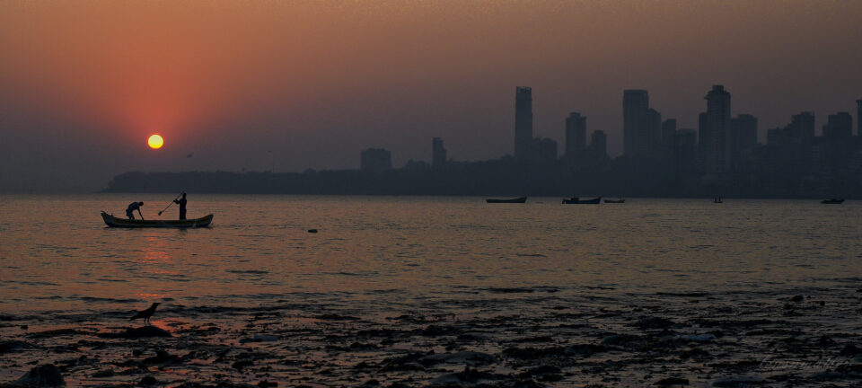 Mumbai sunset skyline along the water