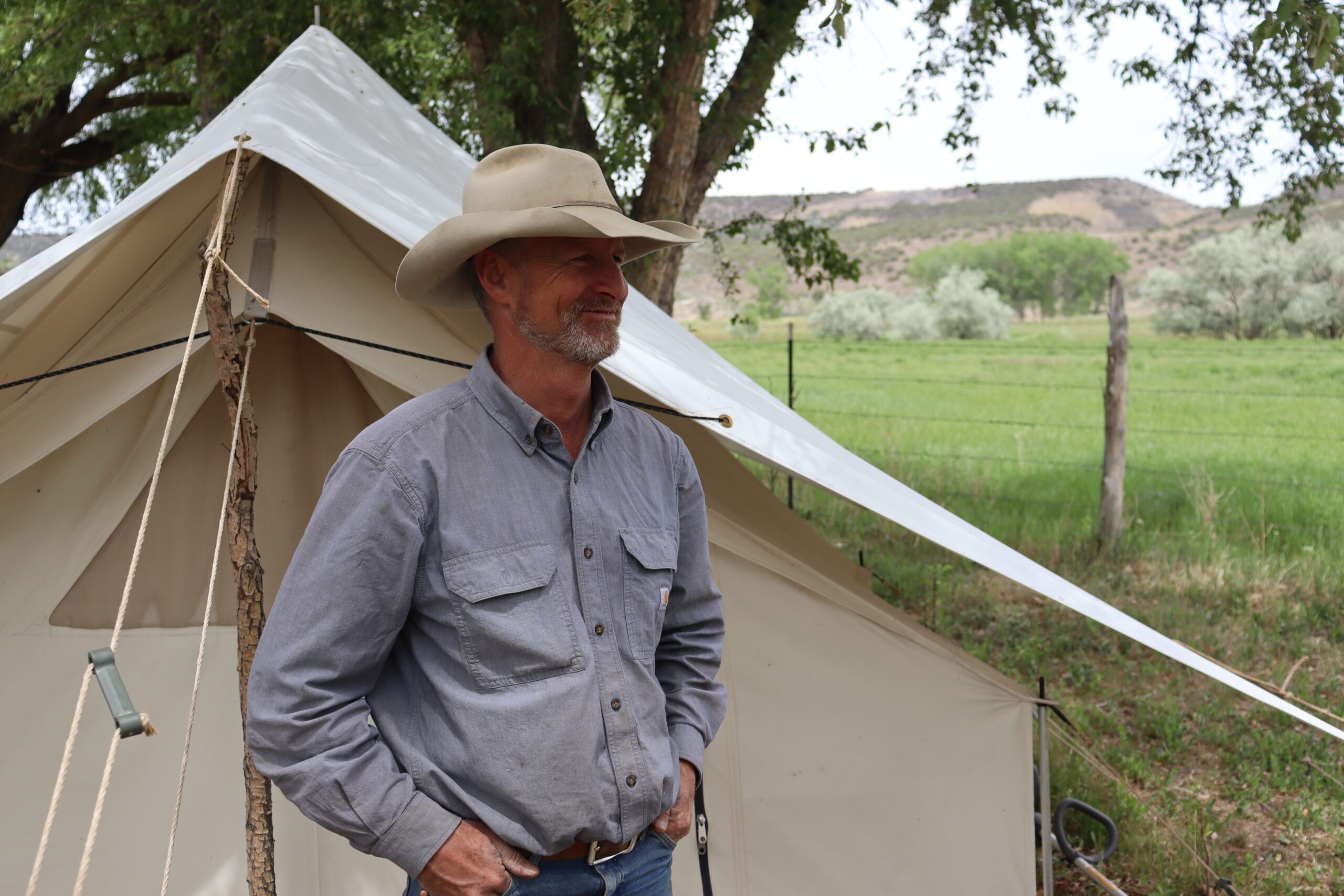 Jim Howell in front of his tent at Harts Basin Ranch