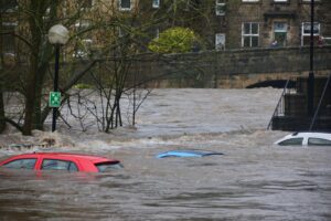 Cars submerged in floodwater