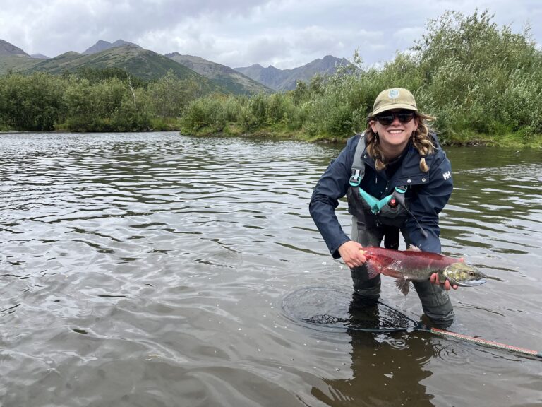 Andie Norton holds a salmon