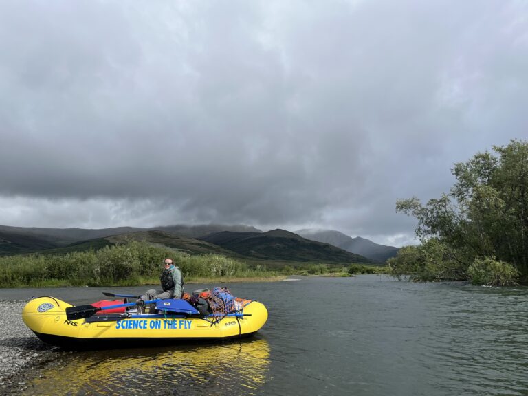 Science on the fly raft along the shores of the Kanektok river