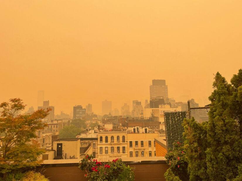 thick yellow haze over east village rooftop in New york city