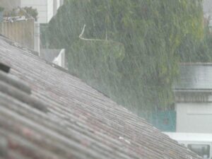 pouring rain on a sloped roof