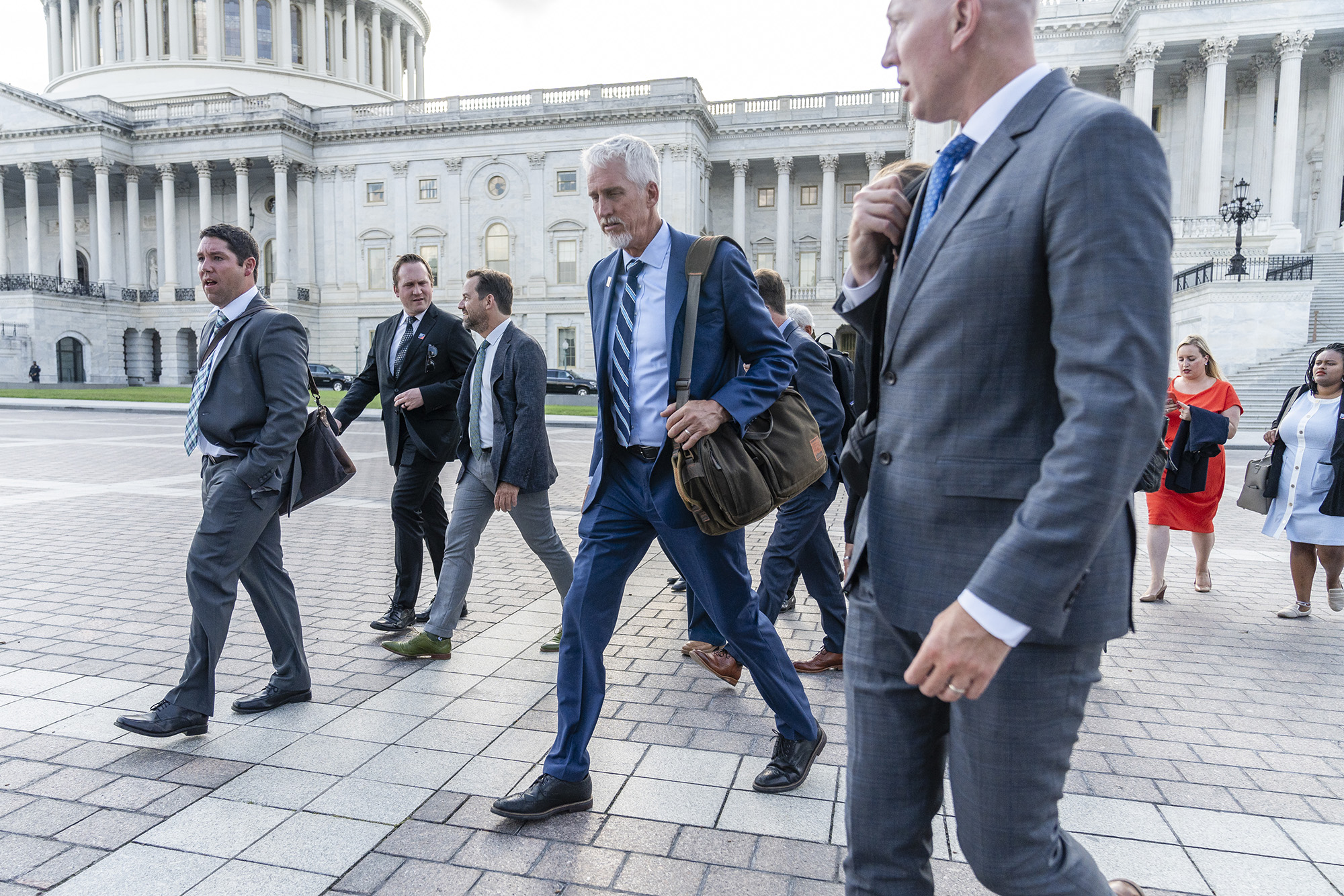 GR team and scientists walking in front of capitol building