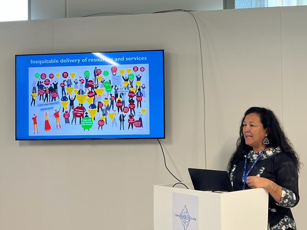 Jackie Qataliña Schaeffer from the Alaska Native Tribal Health Consortium presenting during Permafrost Day at COP28 in Dubai.