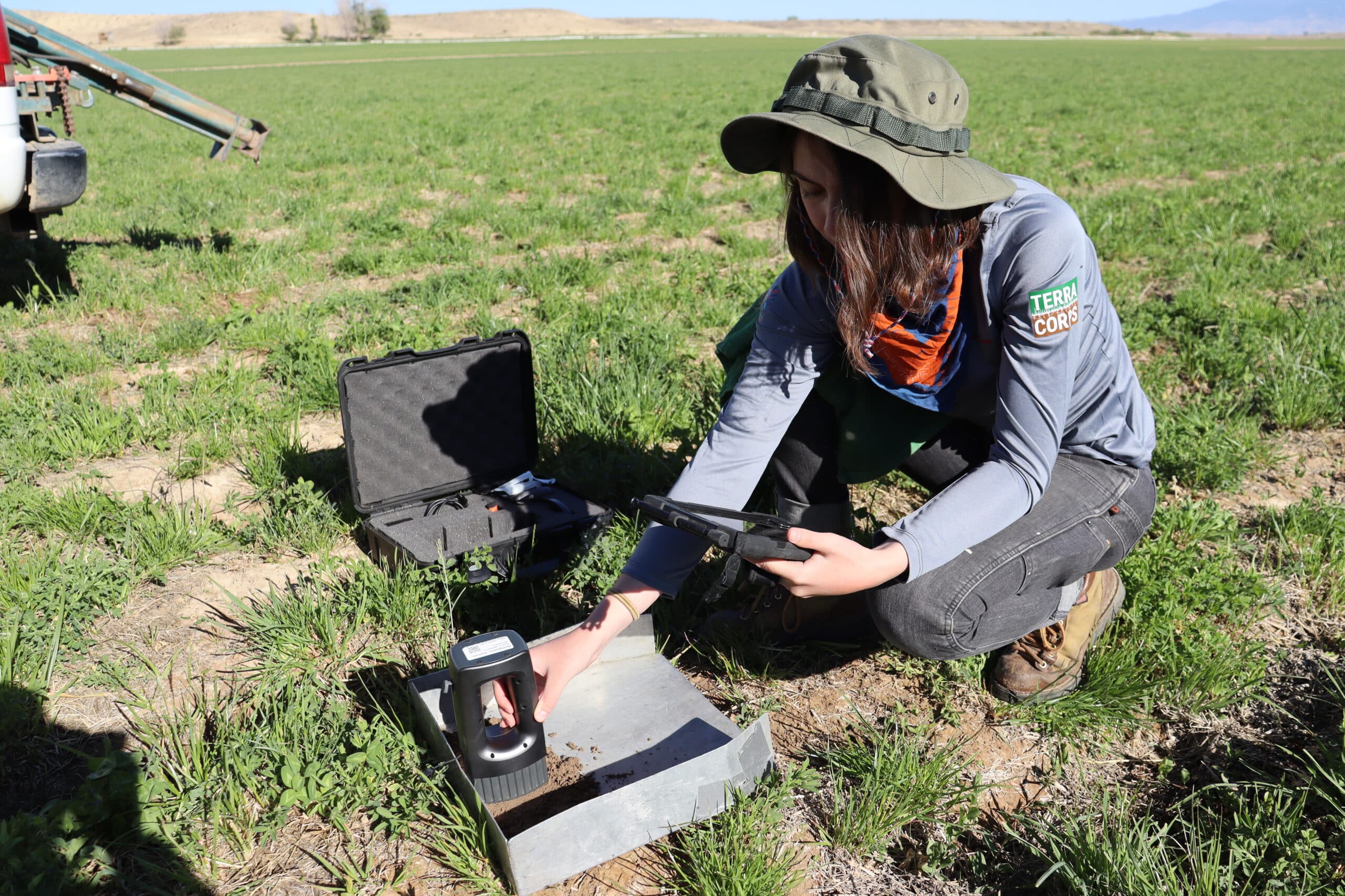 colleen smith scans soil with a soil spectrometer in valdez colorado