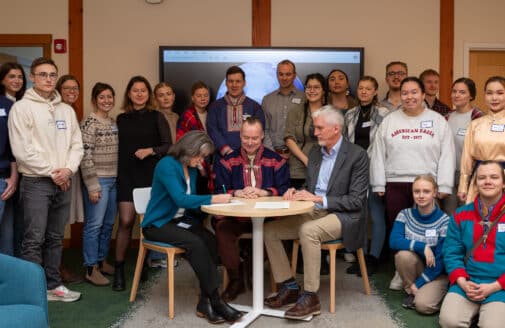 Arctic Indigenous youth leaders gather with Arctic Initiative, Woodwell Climate, and ICR staff as the MOU is signed.