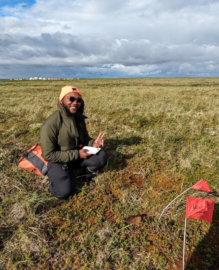 Nigel Golden investigating plant diversity in tundra ecosystems.