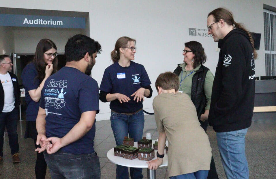 Dr. Anna Liljedahl explaining ice wedges to a family.