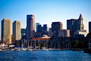 a view of the Boston skyline from the harbor