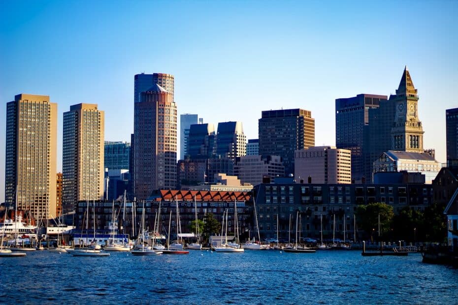 a view of the Boston skyline from the harbor