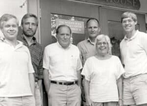 black and white photo of a group of 6 people, 5 men and 1 woman. George Woodwell is pictured at center