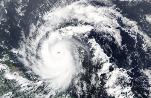 a satellite image looking straight down at Hurricane Beryl's swirling array of clouds