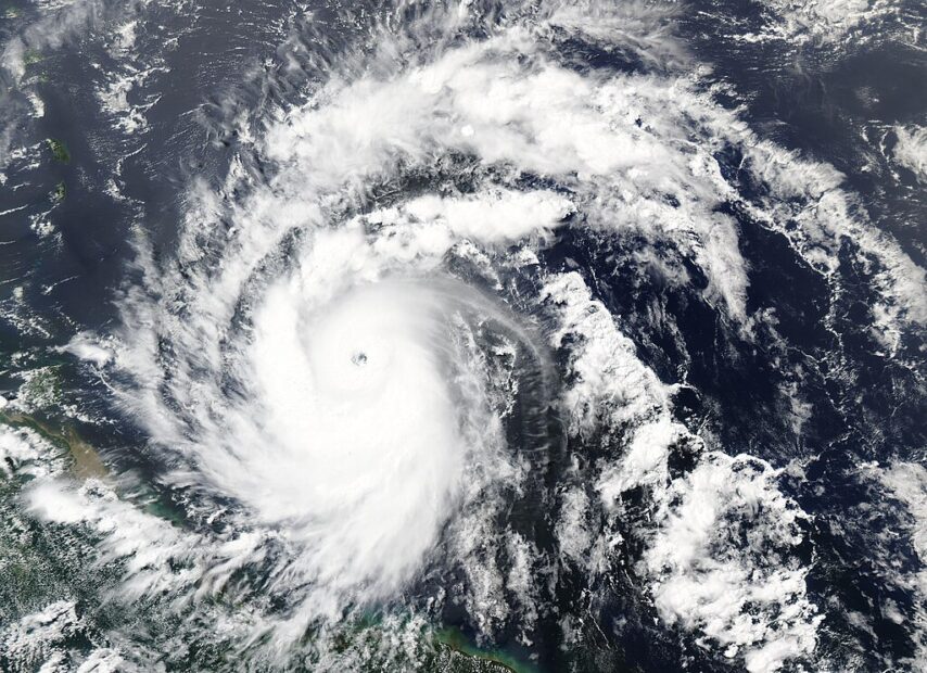 a satellite image looking straight down at Hurricane Beryl's swirling array of clouds