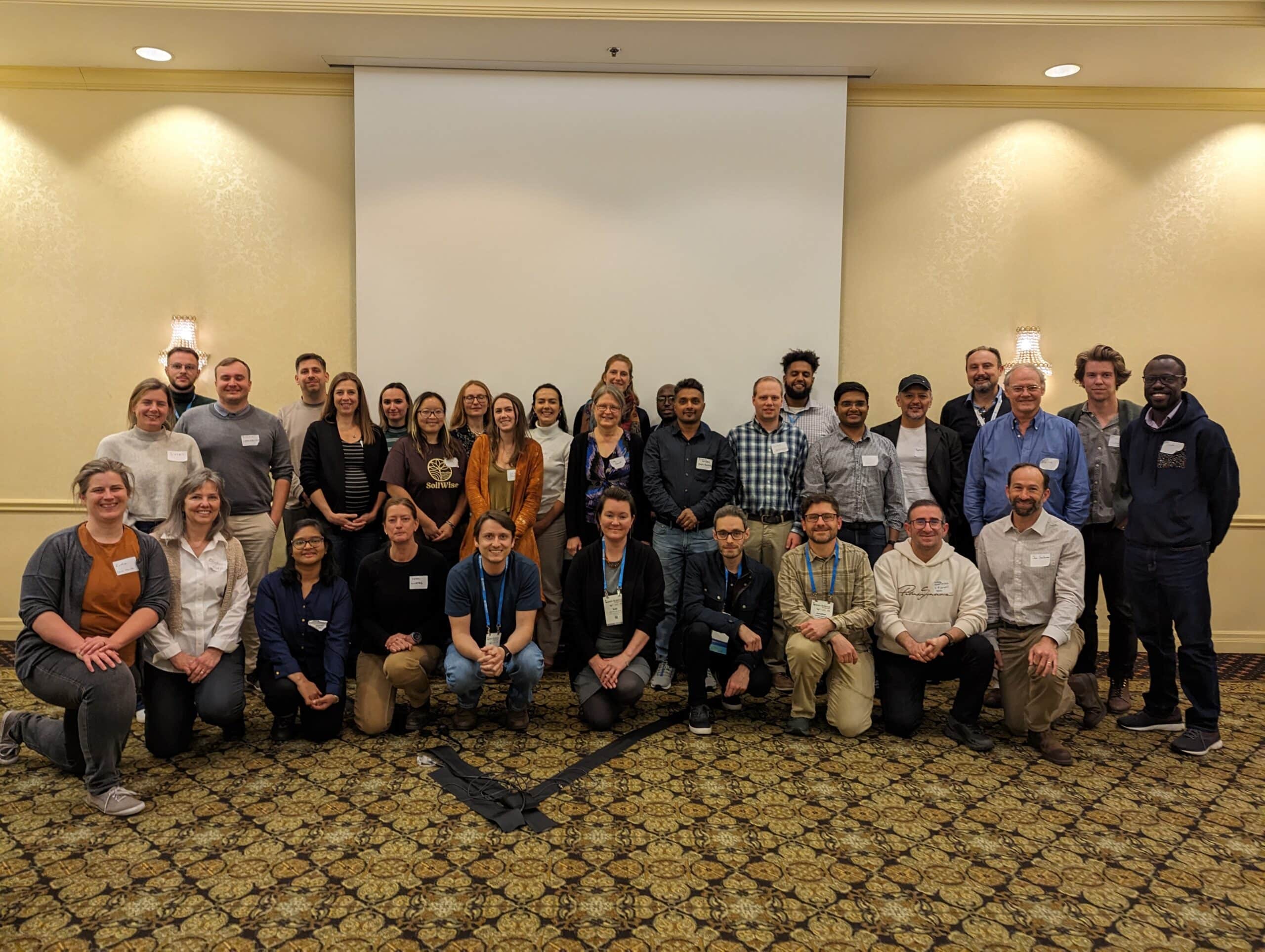 a group photo of conference attendees