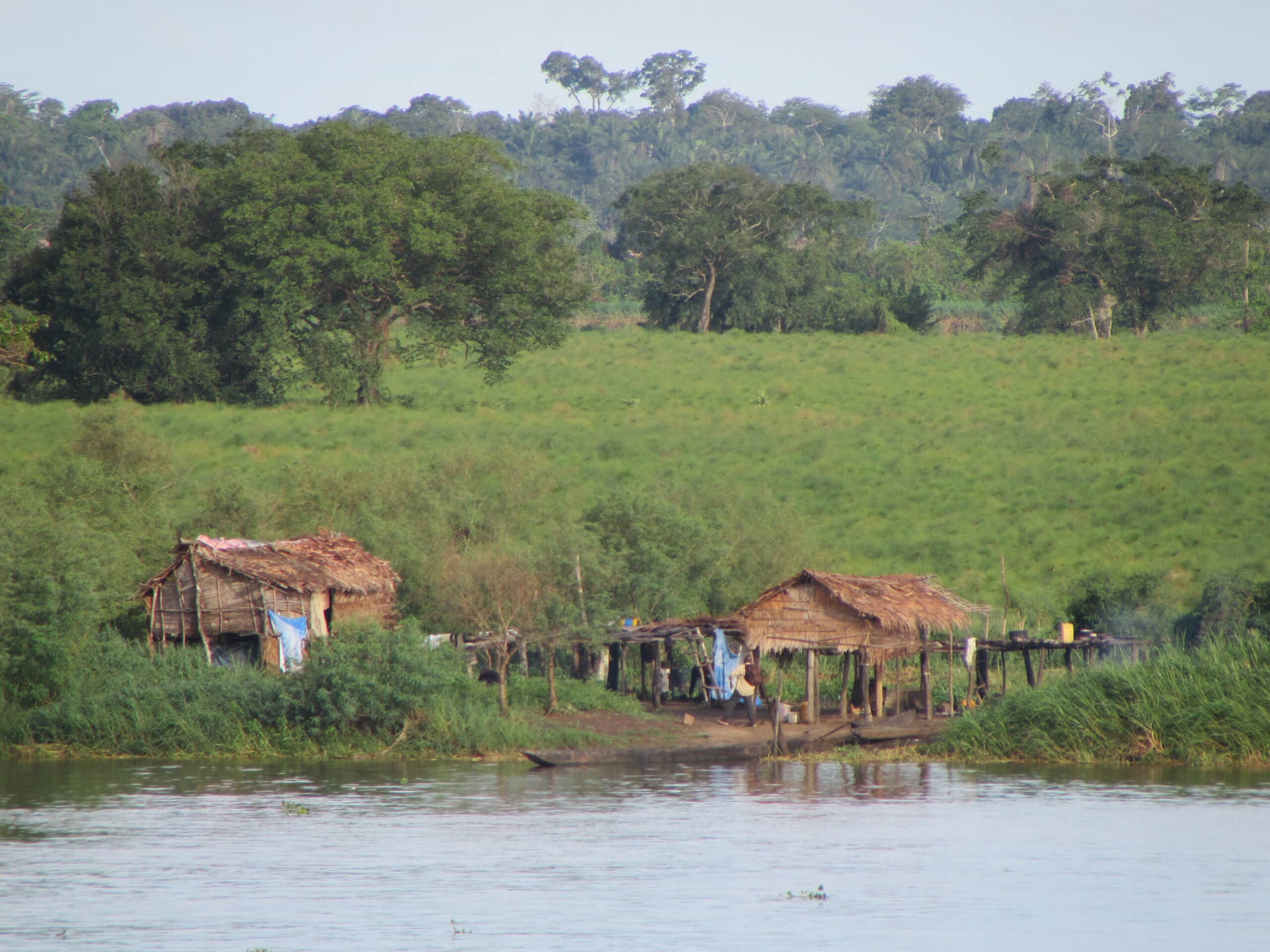 small house on rivers edge in congo