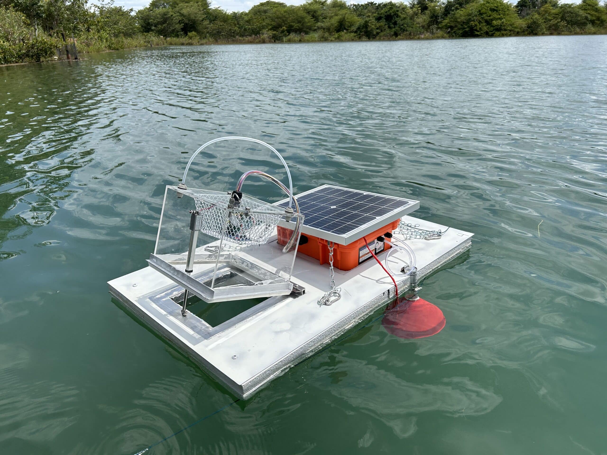 floating methane monitoring chamber with clear plexiglass box atop foam board