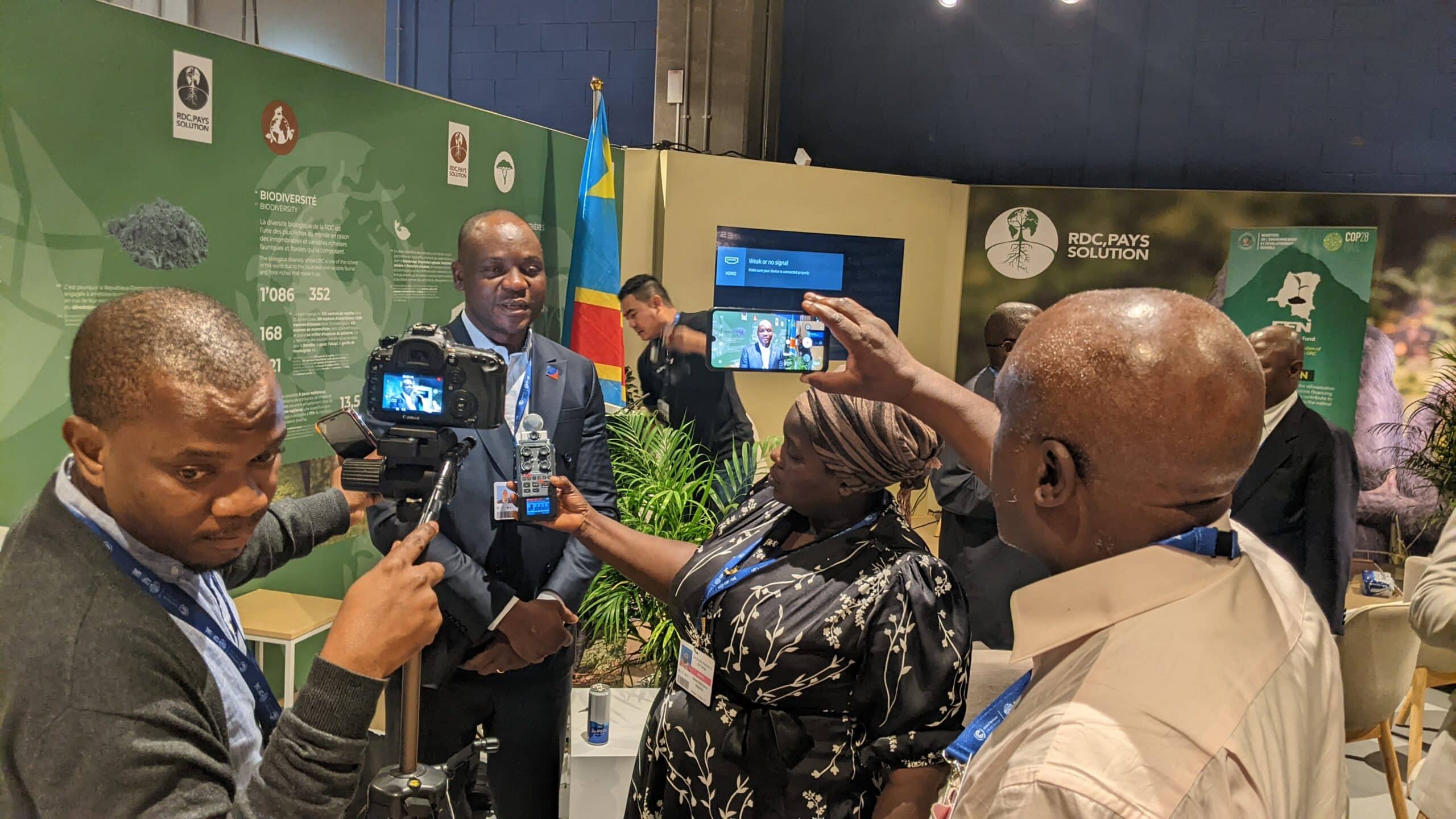 joseph zambo speaks to congoles journalists at cop28 in dubai